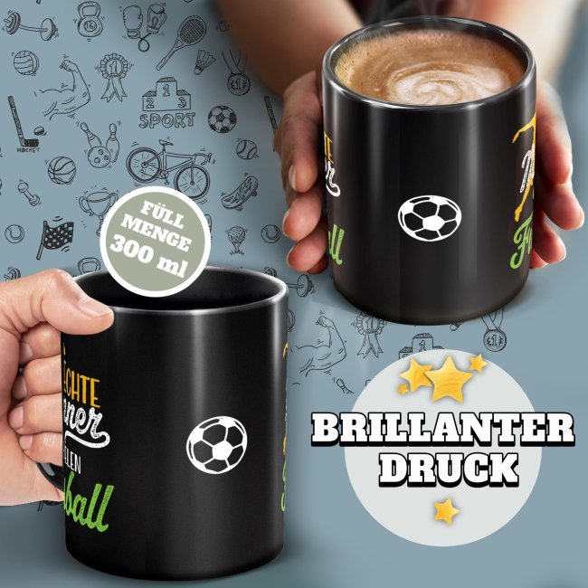 Schwarze Tasse mit Spruch - Echte M&auml;nner spielen Fu&szlig;ball