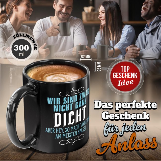 Schwarze Tasse mit Spruch - Wir sind nicht ganz dicht